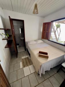 Postel nebo postele na pokoji v ubytování Casa Boa Suites