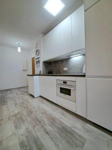 Η κουζίνα ή μικρή κουζίνα στο Komfort Alexa