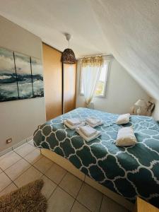 Postel nebo postele na pokoji v ubytování Le paillette T2 400 m de la plage Berck