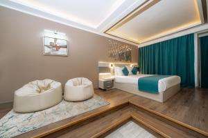 SIRENA BEACH RESORT & SPA客房内的一张或多张床位