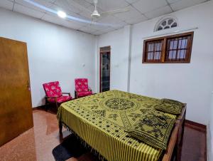 Postel nebo postele na pokoji v ubytování Sea Lavender Villa