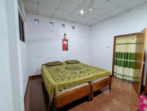 Postel nebo postele na pokoji v ubytování Sea Lavender Villa