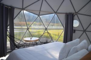 Fotografie z fotogalerie ubytování Ciprés Glamping Domo Geodésico v destinaci Mascota