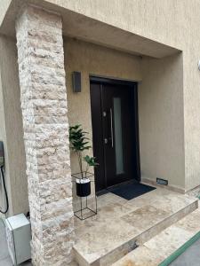 Muka bangunan atau pintu masuk Fully furnished and equipped house