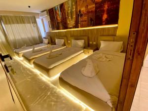 Voodi või voodid majutusasutuse Moonlight pyramids view INN toas