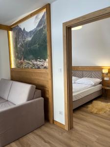 Postel nebo postele na pokoji v ubytování Tatra Widok