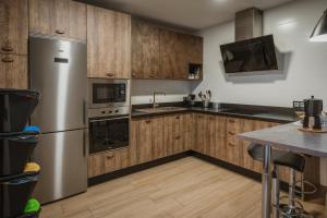 A kitchen or kitchenette at La Olma