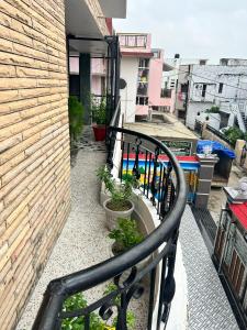 Balkón nebo terasa v ubytování Kalash Guest House