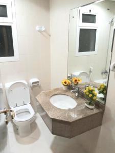 Un baño de غرفة خاصة لشخص