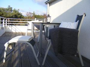 Balkón nebo terasa v ubytování Ferienwohnung Strandkorb