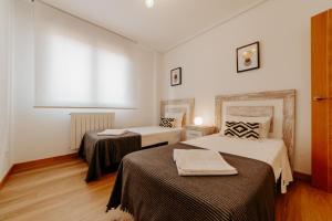 Posteľ alebo postele v izbe v ubytovaní Apartamento San Vicente de la Sonsierra Confort