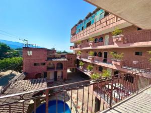 a balcony view of a building with a building at hotel brisas del pacifico in Puerto Vallarta