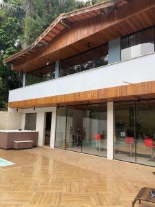 Gambar di galeri bagi Casa lazer duplex di Nova Friburgo