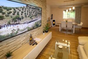 TV a/nebo společenská místnost v ubytování Apartamento Fuentesal