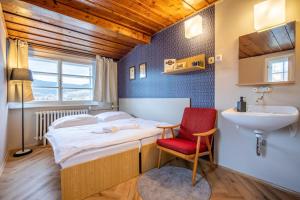 Postel nebo postele na pokoji v ubytování Aparthotel Panorama