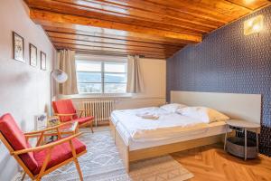 Postel nebo postele na pokoji v ubytování Aparthotel Panorama