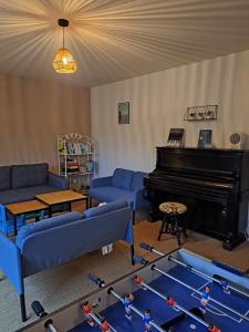 Posezení v ubytování Chambre dans maison en colocation