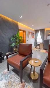 Un lugar para sentarse en MULLINER TOWERS OPPOSITE IKOYI CLUB - Luxury 3BR in Ikoyi - elevator, pool, gym, 24h light, security