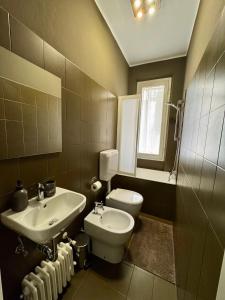 Koupelna v ubytování Vittorio Home