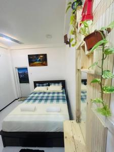 Ένα ή περισσότερα κρεβάτια σε δωμάτιο στο Nisha Grean Heaven +44 φωτογραφίες