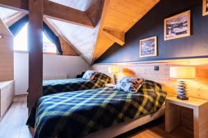 Ένα ή περισσότερα κρεβάτια σε δωμάτιο στο Chalet Mouflon - Magnifique appartement - vue a couper le souffle MAE-1731