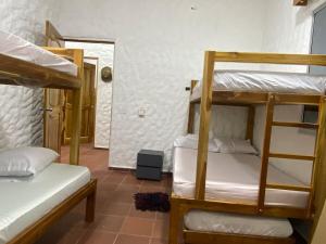 Postel nebo postele na pokoji v ubytování Cabaña con piscina para disfrute social y familiar