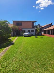 En have udenfor Casa Fávero - Bairro Araça