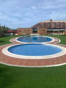 an overhead view of a swimming pool in a building at Torremar - Magic World - Marina d'or in El Borseral