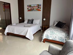Voodi või voodid majutusasutuse Hotel la casona de Wiky toas