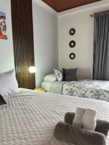 Voodi või voodid majutusasutuse Hotel la casona de Wiky toas