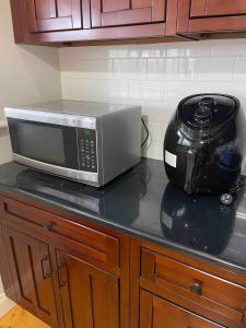 Η κουζίνα ή μικρή κουζίνα στο Schillington Cottage