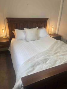 Ένα ή περισσότερα κρεβάτια σε δωμάτιο στο Schillington Cottage