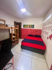 Ένα ή περισσότερα κρεβάτια σε δωμάτιο στο Hostel do Rasta
