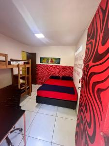 Ένα ή περισσότερα κρεβάτια σε δωμάτιο στο Hostel do Rasta +78 φωτογραφίες