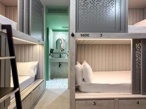 Katil atau katil-katil dalam bilik di Coeo Hernan Ruiz Rooftop Pool Hostel