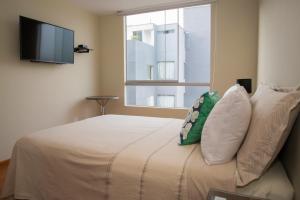 TV a/nebo společenská místnost v ubytování LA POSADA DE GUILLE LUXURY 2 HABITACIONES - Surco