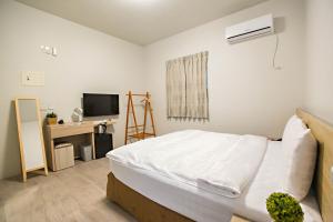 TV a/nebo společenská místnost v ubytování Success 66 B&B