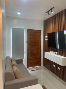Televisyen dan/atau pusat hiburan di HUN'S Cozynest +2 gambar