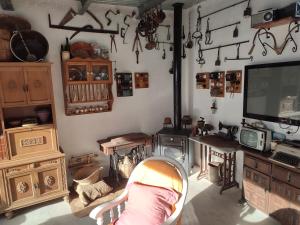 a room filled with lots of furniture and a tv at Exclusivo Chalet a Pie de Costa in Alcanar