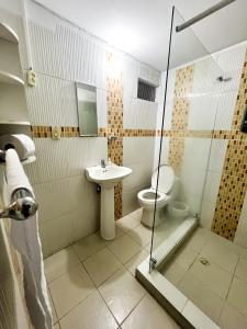 Koupelna v ubytování Hotel Yellow Maraya, Pereira