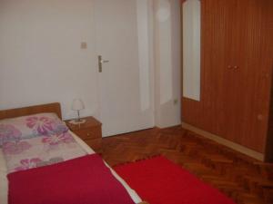 Posteľ alebo postele v izbe v ubytovaní Apartments Darko