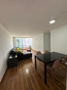 Postel nebo postele na pokoji v ubytování El Derby 511 Apart 1 Dorm con Aire Acondicionado