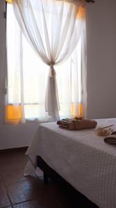 Ένα ή περισσότερα κρεβάτια σε δωμάτιο στο Casas de Época - Arrebol +23 φωτογραφίες