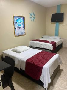 Postel nebo postele na pokoji v ubytování Hostal Real Piura - Oficial + 20 fotografií