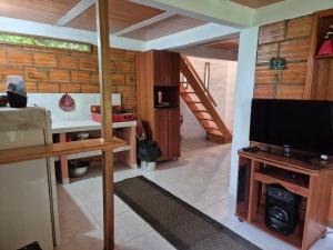 TV a/nebo společenská místnost v ubytování Cabaña Campestre de Descanso