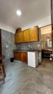 Η κουζίνα ή μικρή κουζίνα στο Vila Lua Aparts - Apartamento 6 +15 φωτογραφίες