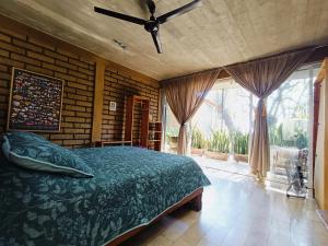 Ένα ή περισσότερα κρεβάτια σε δωμάτιο στο Casa Santi H +10 φωτογραφίες