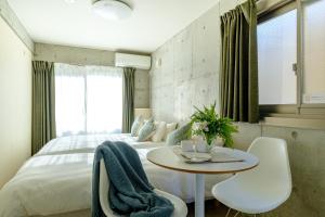 Postel nebo postele na pokoji v ubytování DeLIGHT HOTEL