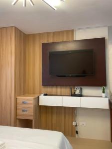 TV a/nebo společenská místnost v ubytování Marina town Spatial condominium