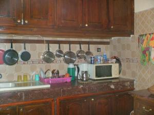 Kuchyň nebo kuchyňský kout v ubytování Riad Karmel Rose de Marrakech